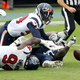 Texans LB Jacob Martin (top) is latest NFL gridder to test positive for COVID-19.